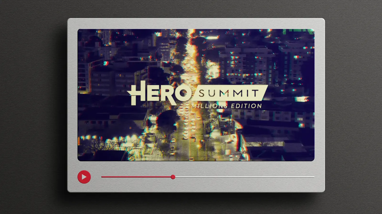 A mockup of a video screen with a frame of a video with the logo HeroSummit Million Edition